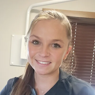 A headshot photo of Kaylie