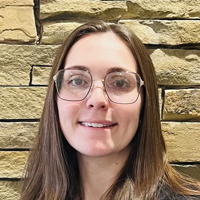 A headshot photo o f Kelsey